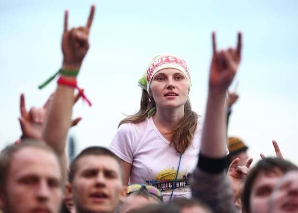 TVER REGION, RUSSIA - JULY 8, 2016: People attend the 16th Nashestvie (Invasion) rock music festival in the village of Bolshoye Zavidovo. Alexander Ryumin TASS  TS0296A3