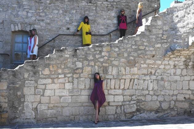 Models present creations by Pierre Cardin during a fashion show in Lacoste, southern France, July 9, 2016. ) FRANCE-FASHION-PIERRE CARDIN LixGenxing 