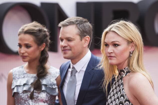 London, UK. 11 July 2016. L-R: Alicia Vikander, Matt Damon and Julia Stiles. Red carpet arrivals for the European Premiere of the Universal movie Jason Bourne (2016) in London s Leicester Square. European Premiere of Jason Bourne, London, UK 