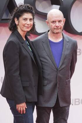 London, UK. 11 July 2016. Producer Amanda Posey and writer Nick Hornby. Red carpet arrivals for the European Premiere of the Universal movie Jason Bourne (2016) in London s Leicester Square. European Premiere of Jason Bourne, London, UK 