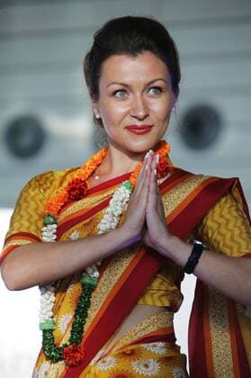MOSCOW REGION, RUSSIA - JULY 12, 2016: An Air India employee showcases clothes during the 2016 DME Runway fashion show marking International Flight Attendant Day at Domodedovo International Airport. Mikhail Metzel TASS  TS029C27