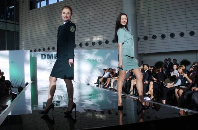 MOSCOW REGION, RUSSIA - JULY 12, 2016: Russian Customs officers showcase clothes during the 2016 DME Runway fashion show marking International Flight Attendant Day at Domodedovo International Airport. Mikhail Metzel TASS  TS029C2F