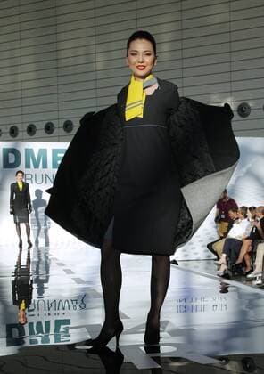 MOSCOW REGION, RUSSIA - JULY 12, 2016: A model showcases a Spanish Air flight attendant s uniform during the 2016 DME Runway fashion show marking International Flight Attendant Day at Domodedovo International Airport. Mikhail Metzel TASS  TS029C3A
