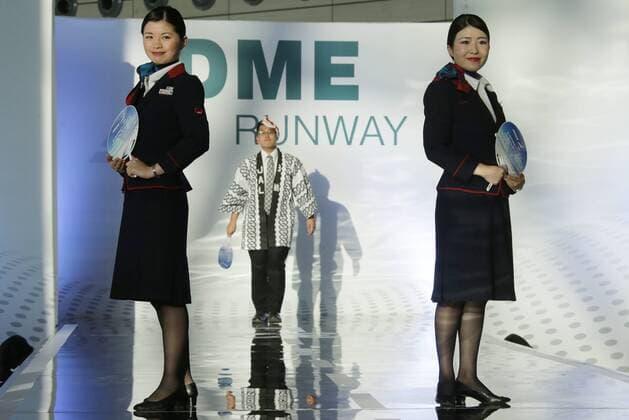 MOSCOW REGION, RUSSIA - JULY 12, 2016: Japan Airlines employees showcase clothes during the 2016 DME Runway fashion show marking International Flight Attendant Day at Domodedovo International Airport. Mikhail Metzel TASS  TS029C63
