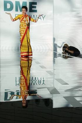 MOSCOW REGION, RUSSIA - JULY 12, 2016: A model showcases an Air India flight attendant s uniform during the 2016 DME Runway fashion show marking International Flight Attendant Day at Domodedovo International Airport. Mikhail Metzel TASS  TS029C65