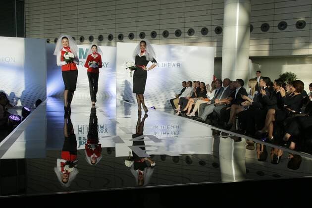 MOSCOW REGION, RUSSIA - JULY 12, 2016: Rusline employees showcase clothes during the 2016 DME Runway fashion show marking International Flight Attendant Day at Domodedovo International Airport. Mikhail Metzel TASS  TS029C6A