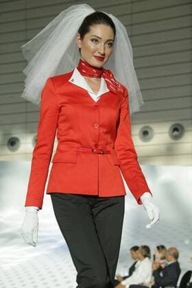 MOSCOW REGION, RUSSIA - JULY 12, 2016: A Rusline employee showcases clothes during the 2016 DME Runway fashion show marking International Flight Attendant Day at Domodedovo International Airport. Mikhail Metzel TASS  TS029C70