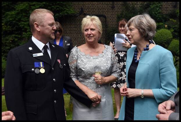. 14 07 2016. London, United Kingdom. Prime Minister- Police Bravery Awards. The Prime Minister Theresa May meets PC Sean Cannon at a reception for the Police Bravery Award in the garden of No10 Downing Street.  xAndrewxParsonsx xi-Imagesx IIM-13174-0006