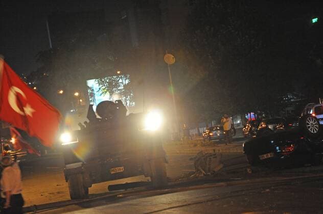 Turkish people protest against the coup in Ankara, Turkey, late Friday, July 15, 2016. Members of Turkey s armed forces said they had taken control of the country, but Turkish officials said the coup attempt had been repelled early Saturday morning in a night of violence, according to state-run media.  15437859