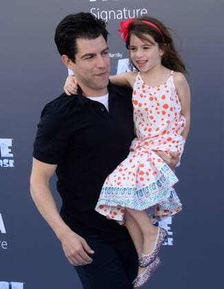 Cast member Max Greenfield, the voice of Roger in the animated motion picture sci-fi comedy Ice Age: Collision Course and his daughter Lily attend the premiere of the film at the Zanuck Theater on the 20th Century Fox Studios lot in Los Angeles on July 16, 2016. Storyline: Scrat s epic pursuit of his elusive acorn catapults him outside of Earth, where he accidentally sets off a series of cosmic events that transform and threaten the planet.  LAP2016071660 JIMxRUYMEN