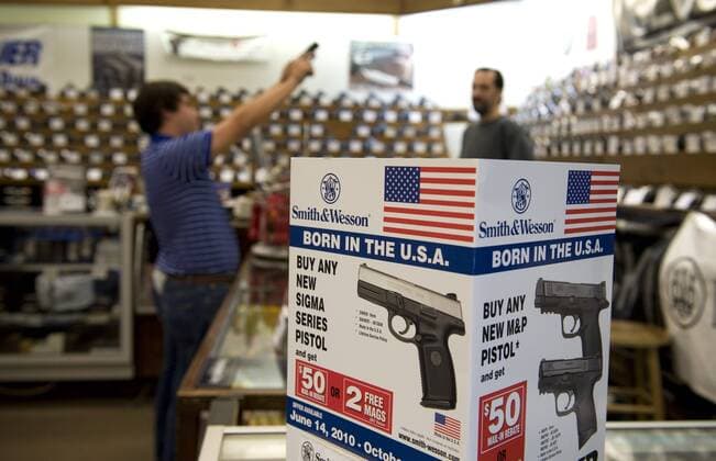 Oct. 2, 2010 - Kennesaw, GA, USA - A wide selection of new handguns for sale is on display at Nick s Gun and Tackle Shop near Kennesaw. - ZUMAn03_