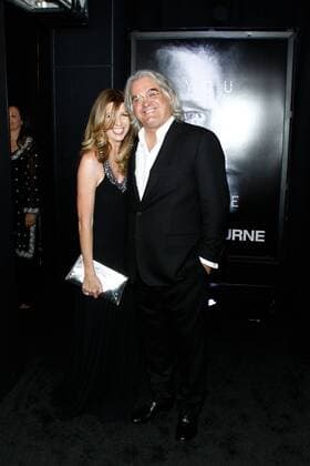 Director Producer Paul Greengrass (R) and his wife Joanna Kaye attend the premiere of the motion picture thriller Jason Bourne at Caesars Palace in Las Vegas, Nevada on July 18, 2016. Storyline: Jason Bourne, now remembering who he truly is, tries to uncover hidden truths about his past.  LAP2016071832 JAMESxATOA