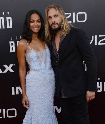Cast member Zoe Saldana and her husband, Italian artist Marco Perego attend the premiere of the sci-fi motion picture thriller Star Trek Beyond at Embarcadero Marina Park South in San Diego, California on July 20, 2016. Storyline: The USS Enterprise crew explores the furthest reaches of uncharted space, where they encounter a new ruthless enemy who puts them and everything the Federation stands for to the test.  SDP2016072004 JIMxRUYMEN