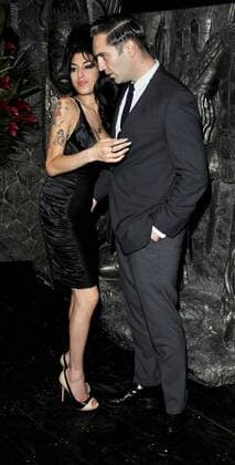 Aug. 04, 2010 - London, Great Britain - Amy Winehouse and Reg Traviss at the Shaka Zulu Bar and Restaurant Launch Party at Shaka Zulu at Stables Market on August 4, 2010 in London. Picture by Can Nguyen LFI  - ZUMAl60_