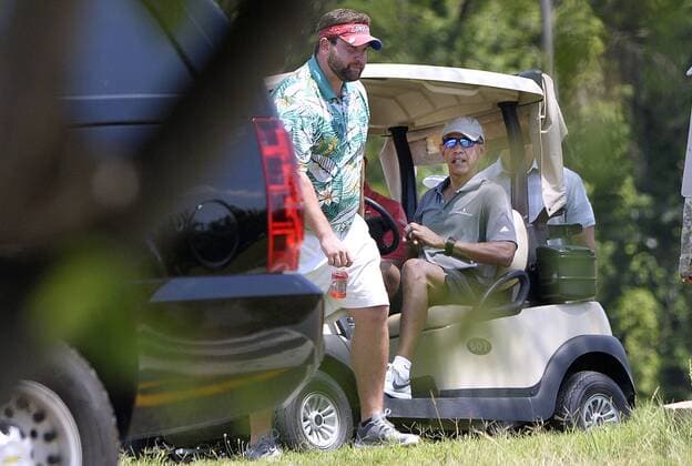 U.S. President Barack Obama parks his golf cart after playing golf at Fort Belvoir July 23, 2016 in Virginia near Washington, DC. Pool  WAX20160723103 OlivierxDouliery