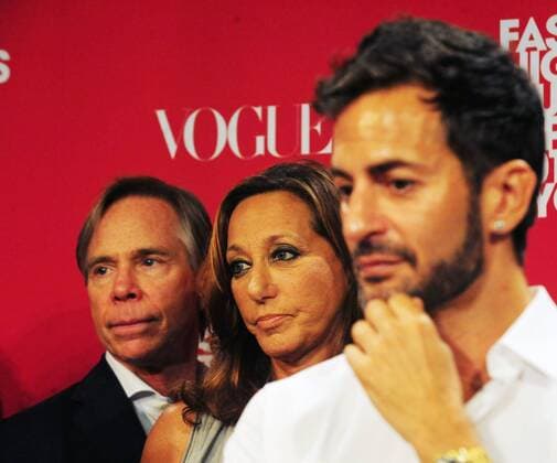 Aug. 11, 2010 - Manhattan, New York, U.S. - Fashion Designers TOMMY HILFIGER, DONNA KARAN and MARC JACOBS look on as Mayor Michael Bloomberg announces expanded Fashion s Night Out for 2010 at a press conference at City Hall. Fashion s Night Out is a citywide event to support retail and fashion in New York City. - ZUMAb09_