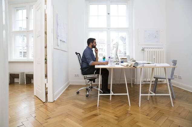Creative professional working in office model released Symbolfoto property released  FKF001846