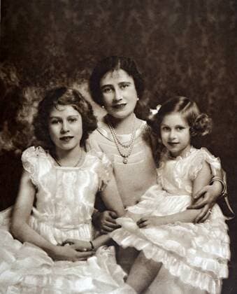 Queen Elizabeth (Elizabeth Bowes Lyon) with her daughters Elizabeth (later Queen Elizabeth II and Princess Margaret 1937 WorldxHistoryxArchive