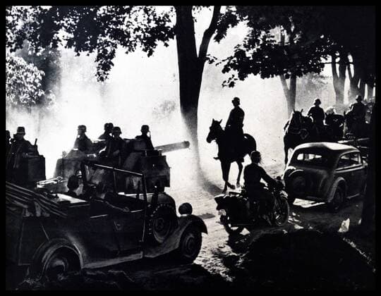 World War II, the German armed forces advance into Polish land along a dusty highway. Dated 1939 WorldxHistoryxArchive