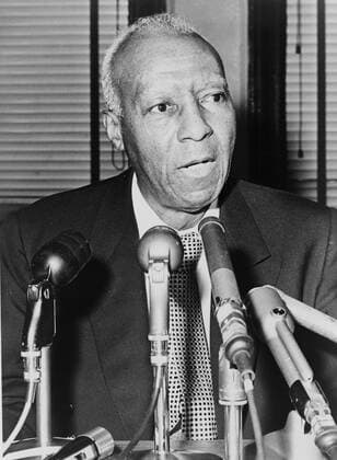 Asa Philip Randolph, half-length portrait, facing slightly right, behind microphones during a press interview World Telegram & Sun photo by Ed Ford. Date 1964.(1964.) Source Library of Congress Prints and Photographs Division. New York World-Telegram and the Sun Newspaper Photograph Collection. http: hdl.loc.gov loc.pnp cph.3c19496 Author New York World-Telegram and the Sun staff photographer WHA  !ACHTUNG AUFNAHMEDATUM GESCHÄTZT! Copyright: WHA UnitedArchives020467