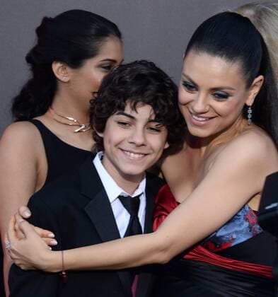 Cast members Embay Anthony (L) and Mila Kunis attend the premiere of the motion picture comedy Bad Moms at Mann Village Theater in the Westwood section of Los Angeles on July 26, 2016. Storyline: When three overworked and under-appreciated moms are pushed beyond their limits, they ditch their conventional responsibilities for a jolt of long overdue freedom, fun, and comedic self-indulgence.  LAP2016072642 JIMxRUYMEN