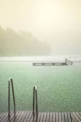 Germany, Bavaria, Burghausen, summer rain at Woehrsee, bathing jetty  HAMF000208