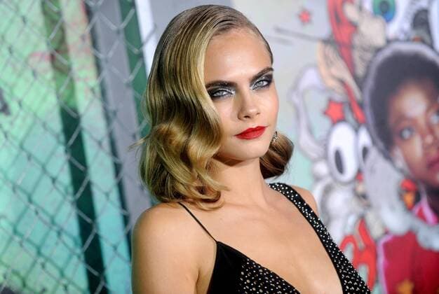 Suicide Squad Premiere in New York Cara Delevingne arrives on the red carpet at the world premiere of Suicide Squad at The Beacon Theatre on August 1, 2016 in New York City.  NYP20160801203 DENNISxVANxTINE