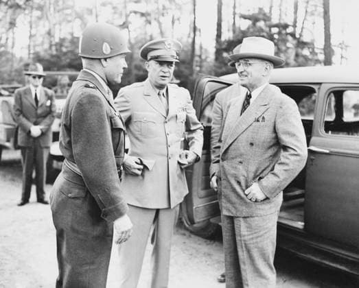 Vintage World War II photo of President Harry Truman, talking with General Dwight Eisenhower and General Doyle Hickey, in Germany.  Copyright: JohnxParrot StocktrekxImages JPA101005M
