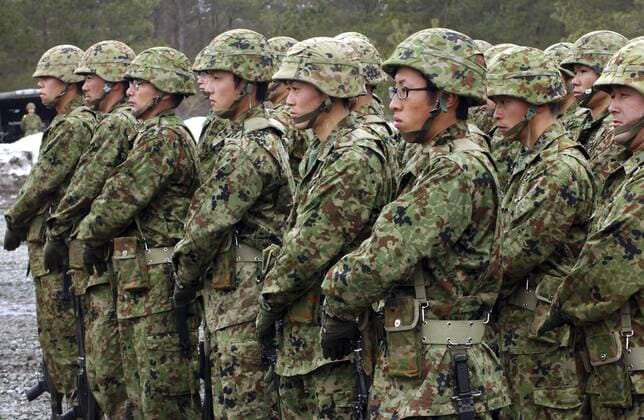 February 22, 2006 - Soldiers from the Japan Ground Self Defense Force perform a rifle salute during the opening ceremony of Exercise Forest Light at Camp Nihonbara, Okayama Prefecture.  Copyright: StocktrekxImages stk102078m