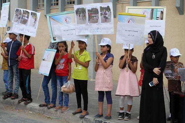 August 7, 2016 - Rafah, Gaza Strip, Palestinian Territory - Palestinian children take part in the bicycles marathon to demand their right to play and break the siege on Gaza strip, in Rafah in the southern Gaza Strip. on August 7, 2016 Rafah Palestinian Territory - ZUMAap3_