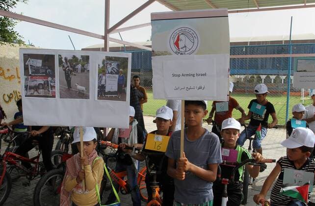 August 7, 2016 - Rafah, Gaza Strip, Palestinian Territory - Palestinian children take part in the bicycles marathon to demand their right to play and break the siege on Gaza strip, in Rafah in the southern Gaza Strip. on August 7, 2016 Rafah Palestinian Territory - ZUMAap3_
