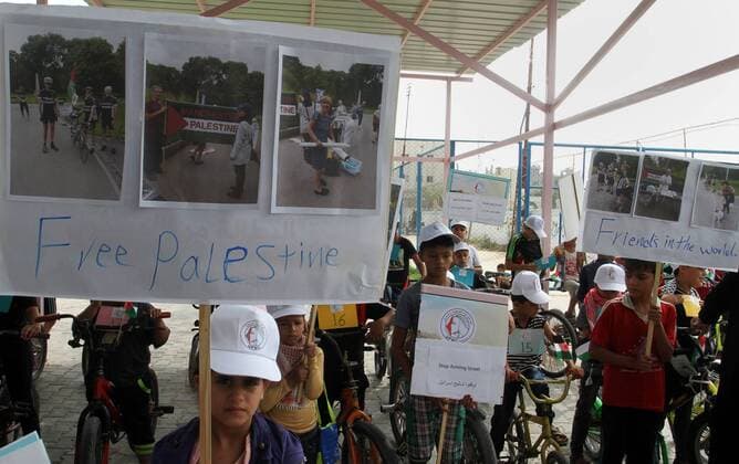 August 7, 2016 - Rafah, Gaza Strip, Palestinian Territory - Palestinian children take part in the bicycles marathon to demand their right to play and break the siege on Gaza strip, in Rafah in the southern Gaza Strip. on August 7, 2016 Rafah Palestinian Territory - ZUMAap3_