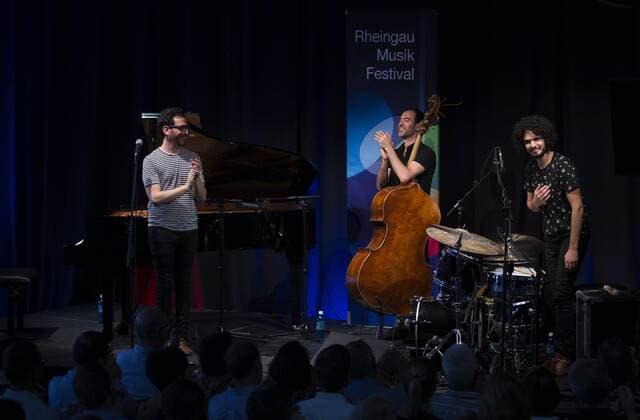 (160808) -- FRANKFURT, Aug. 8, 2016 -- (L to R) Omer Klein, Haggai Cohen-Milo and Amir Bresler, members of Omer Klein Trio take curtain call after the performance during Rheingau Music Festival at the Kuenstler Winery in hochheim, Germany, on Aug. 7, 2016. The 29th Rheingau Music Festival is held from June 18 to Aug. 27. ) (yy) GERMANY-RHEINGAU MUSIC FESTIVAL-OMER KLEIN TRIO-SHOW LUOxHUANHUAN 