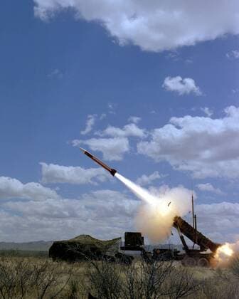 A MIM-104 Patriot anti-aircraft missile is fired during a training exercise.  Copyright: StocktrekxImages stk106529m