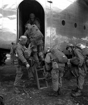 October 20, 1950 - Airborne troops board a plane for their drop behind enemy lines north of Pyongyang, North Korea.  Copyright: StocktrekxImages stk107049m