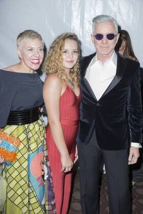 USA: The Get Down premiere in New York Baz Luhrmann (R), Catherine Martin (L), and Lillian Luhrmann (C) attend The Get Down Netflix original series premier at Lehman Center for performing arts in the Bronx.  LevxRadin