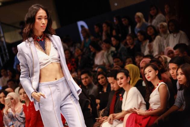 Malaysia: Kuala Lumpur Fashion Week 2016 A model wears a collection by Merrack & Co. during the Kuala Lumpur Fashion Week 2016.  AdyxAbdxRopha