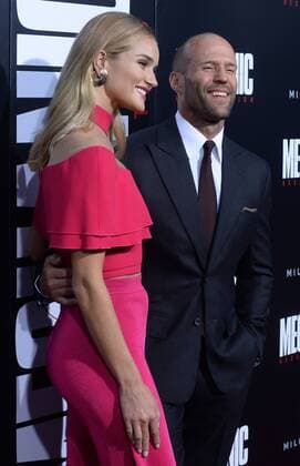 Cast member Jason Statham and his wife, English model Rosie Alice Huntington-Whiteley attend the premiere of the motion picture crime thriller Mechanic: Resurrection at the ArcLight Cinerama Dome in the Hollywood section of Los Angeles on August 22, 2016. Storyline: Arthur Bishop thought he had put his murderous past behind him when his most formidable foe kidnaps the love of his life. Now he is forced to travel the globe to complete three impossible assassinations, and do what he does best, make them look like accidents.  LAP2016082217 JIMxRUYMEN
