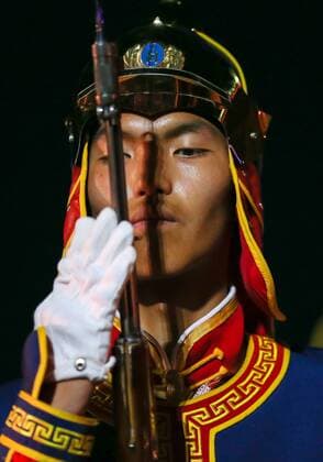 MOSCOW, RUSSIA - AUGUST 27, 2016: A member of the Honor Guard and the Central Military Band of the Armed Forces of Mongolia performs at the opening of the 9th Spasskaya Tower international military music festival in Moscow s Red Square. Artyom Geodakyan TASS  TS02EFBF