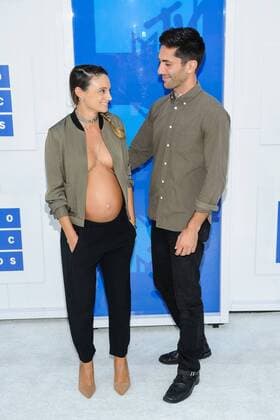 MTV Video Music Awards in New York August 28, 2016 - New, York, New York, U.S. - Actor NEV SCHULMAN with his fiancee LAURA PERLONGO, pregnant and bare chested, at the 2016 MTV Video Music Awards. New York United States - ZUMAa123