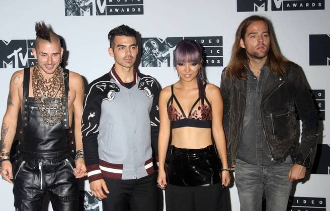 August 28, 2016 - New York, New York, U.S. - Members of DNCE, COLE WHITTLE, JOE JONAS, JINJOO LEE and JACK LAWLESS pose for photos in the press room at the 2016 MTV Video Music Awards held at Madison Square Garden. New York U.S. - ZUMAk03_