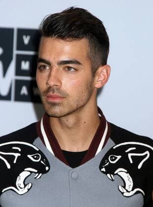 August 28, 2016 - New York, New York, U.S. - Member of DNCE, JOE JONAS poses for photos in the press room at the 2016 MTV Video Music Awards held at Madison Square Garden. New York U.S. - ZUMAk03_