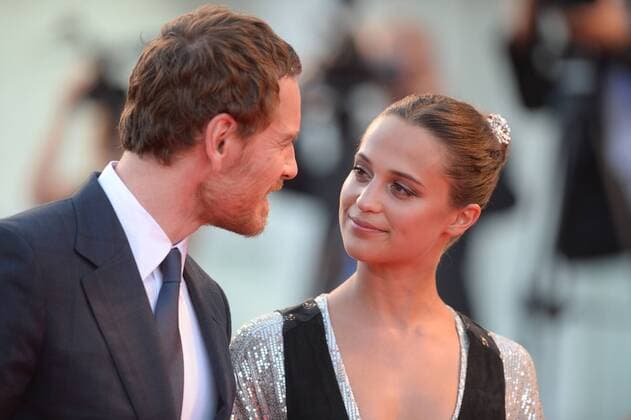 Swedish actress Alicia Vikander and British actor Michael Fassbender attend the premiere of The Light Between Oceans at the 73rd Venice Film Festival on September 1, 2016.  LON20160901130 RUNExHELLESTAD