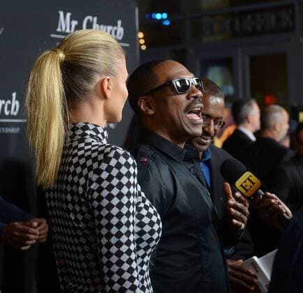 Cast member Eddie Murphy and his girlfriend, Australian actress Paige Butcher attend the premiere of the motion picture drama Mr. Church at the ArcLight Cinema Dome in the Hollywood section of Los Angeles on September 6, 2016. Storyline: Mr. Church tells the story of a unique friendship that develops when a little girl and her dying mother retain the services of a talented cook - Henry Joseph Church. What begins as a six month arrangement instead spans fifteen years, and creates a family bond that lasts forever.  LAP2016090626 JIMxRUYMEN