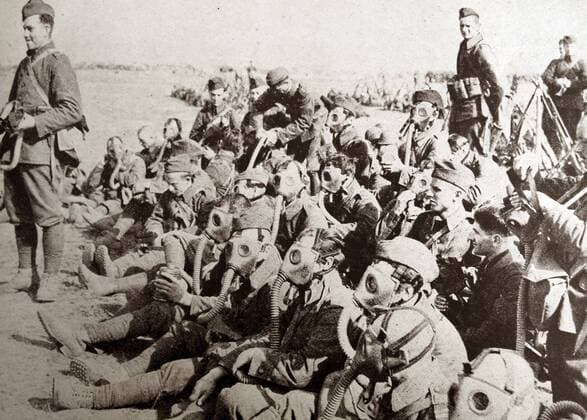 Photograph of Polish troops resting after a gas drill whilst they wait to go into action. Dated 1939 WHA  !ACHTUNG AUFNAHMEDATUM GESCHÄTZT! Copyright: WHA UnitedArchivesWHA_057_0558