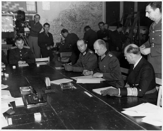 Photograph of Alfred Jodl (1890-1946), German military commander, attaining the position of Chief of the Operations Staff of the Armed Forces High Command during the Dönitz Regime, signing a document of unconditional surrender. Dated 1945 WHA  !ACHTUNG AUFNAHMEDATUM GESCHÄTZT! Copyright: WHA UnitedArchivesWHA_069_0136