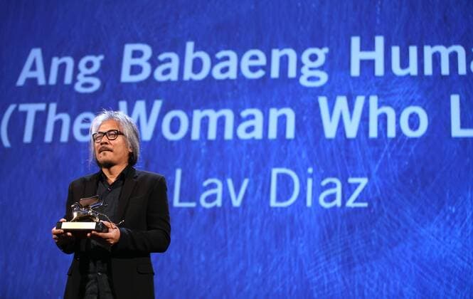 VENICE, Sept. 10, 2016 -- Director Lav Diaz holds the Golden Lion prize for his movie The Woman Who Left during the award ceremony at the 73rd Venice Film Festival, at the Lido of Venice, Italy, Sept. 10, 2016. The Woman Who Left by Philippine director Lav Diaz won the Golden Lion, the highest prize presented at the 73rd Venice International Film Festival which concluded here on Saturday evening. )(axy) ITALY-VENICE-73RD FILM FESTIVAL-AWARD JinxYu 