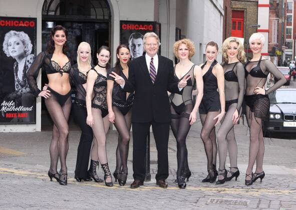Feb 17, 2009 - London, England, United Kingdom - JERRY SPRINGER joins the cast of Chicago for six weeks in the summer of 2009. The legendary chat show host has been cast to play Billy Flynn in the London staging of the musical. Springer posed outside the Cambridge Theatre with a number of lingerie clad beauties from the show to promote his appearance between the 1st June 2009 and the 11th July 2009.  - ZUMAd33_