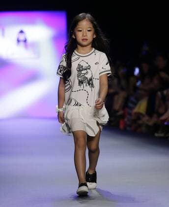 A child model walks on the runway at the Comme Tu Es fashion show during New York Fashion Week: The Shows at The Dock, Skylight at Moynihan Station in New York City on September 13, 2016.  NYP20160913504 JOHNxANGELILLO