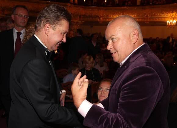 MOSCOW, RUSSIA - SEPTEMBER 13, 2016: Chairman of the board of directors at Gazprom, Alexei Miller (L) and journalist Dmitry Kiselev shake hands at Moscow s Bolshoi Theatre before a production of Giuseppe Verdi s opera Simon Boccanegra presented by the Teatro alla Scala (Milan s grand opera house) as part of the 2016 Chereshnevy Les Open Art Festival. Artyom Korotayev TASS  TS03116F